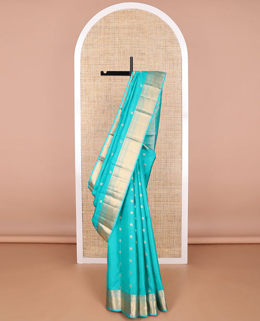 Light blue buttas vasundhara elite silk saree with self intricate zari design border & floral jaal design pallu