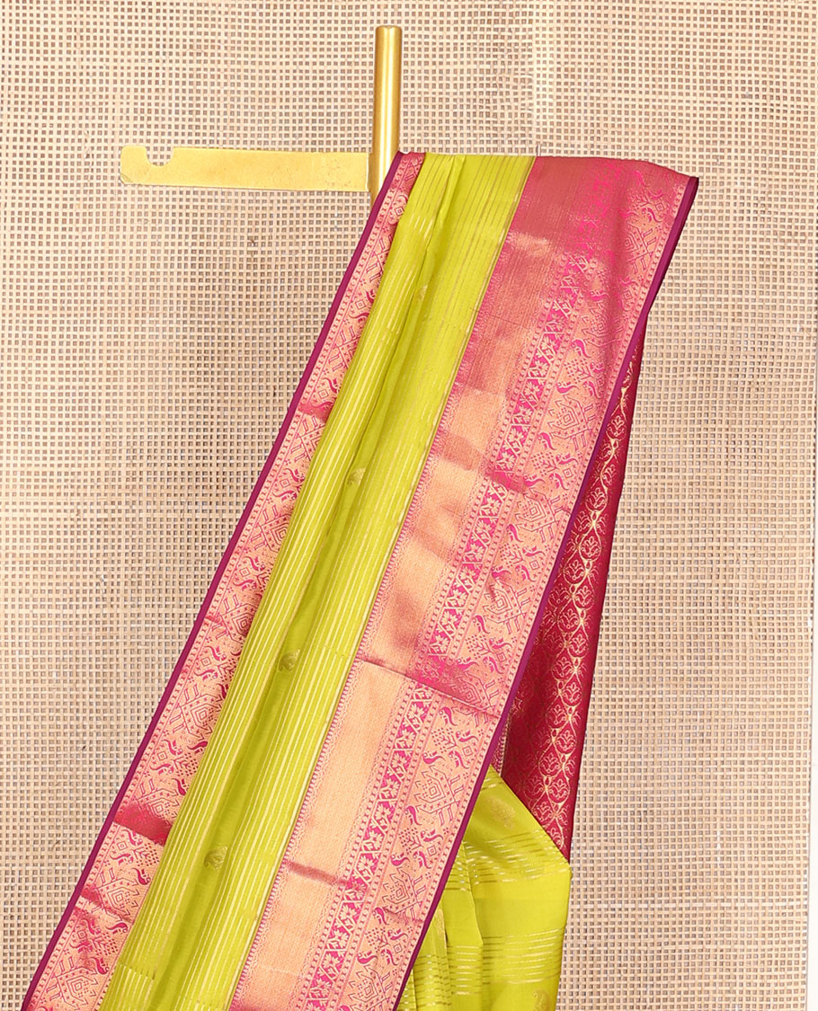 Yellow zari stripes & manga buttas Vasundhara silk mix saree, contrast paithani-style zari border & thilakam motifs steeped pallu