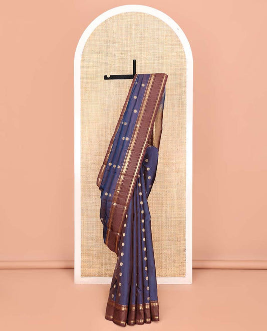 Blue Vasundhara Lite Silk Mix Saree, Embellished with Zari Buttas All Over Its Body, Complemented by Contrast Varisai Pettu Border of Rekku, Muthu, Annam Chakram, and Kathir Designs, Grand Pallu of Jaal Design, and Paired with a Contrast Blouse