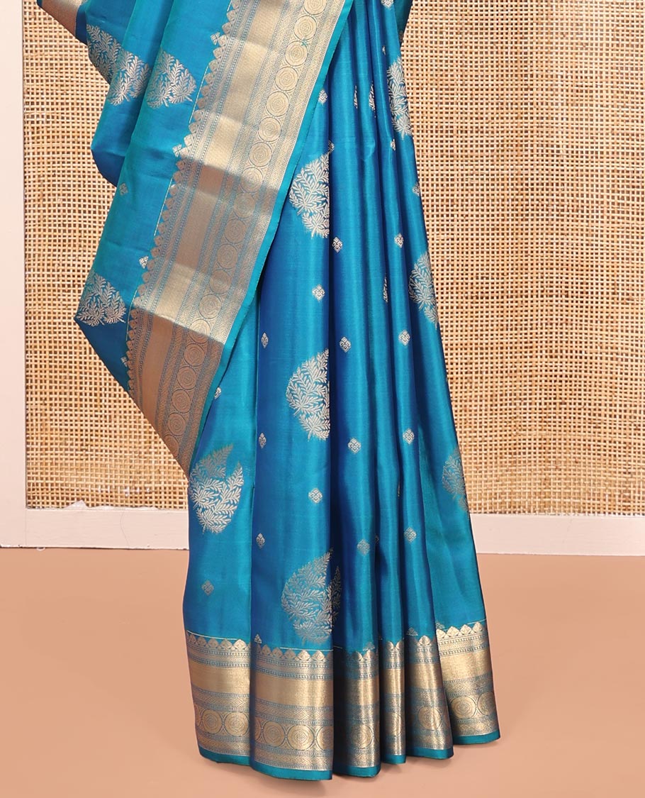 Blue Vasundhara Silk Mix Saree, Detailed with Zari Buttas All Over Its Body, Highlighted by Zari Border of Diamond and Chakram Designs, Grand Vanki Design Pallu, and Paired with a Matching Blouse