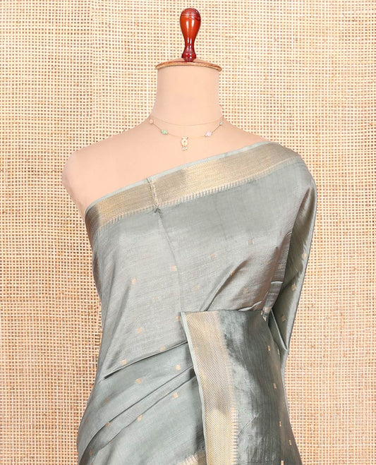 Grey Banana Pith Saree Elevated with Zari Buttas, Temple Border of Zari Designs, Subtle Pallu of Zari Designs, and Paired with a Matching Blouse