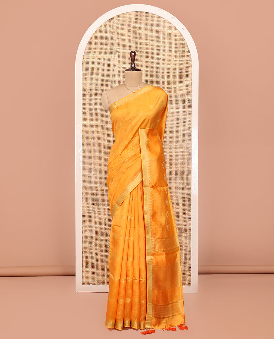 Yellow Banana Pith Saree, Sparsely Sparkled with Buttas All Over Its Body, Highlighted by Temple Zari Border, Pallu Steeped with Stripes, and Paired with a Matching Blouse