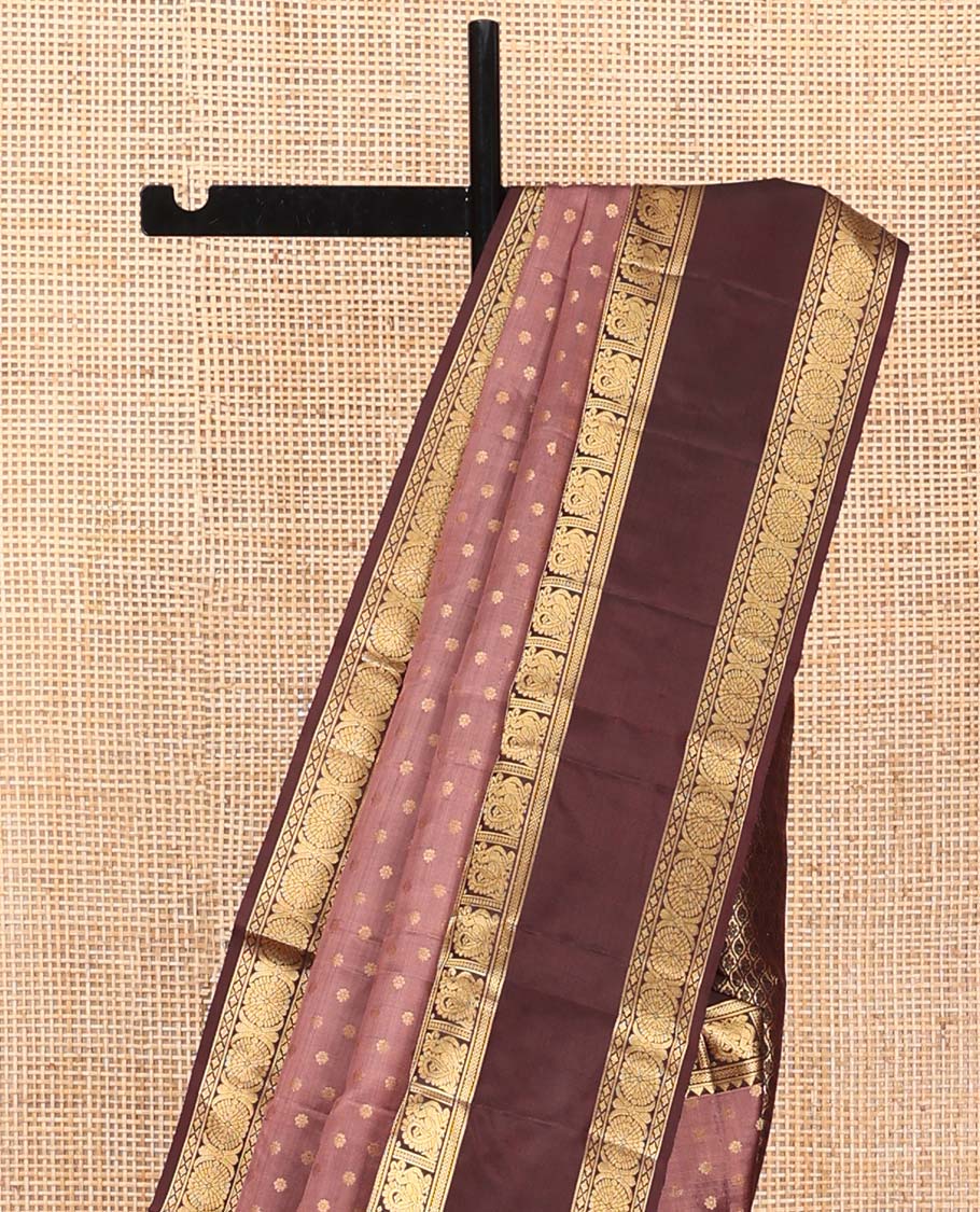 Brown Vasundhara Silk Saree, Beautified with Floral Buttas on Its Body, Complemented by a Contrast Rettai Pettu Border of Rekku, Kathir, Annam Lavangam, and Cross Kamalam Designs, Pallu of Jaal Designs, and Paired with a Contrast Blouse