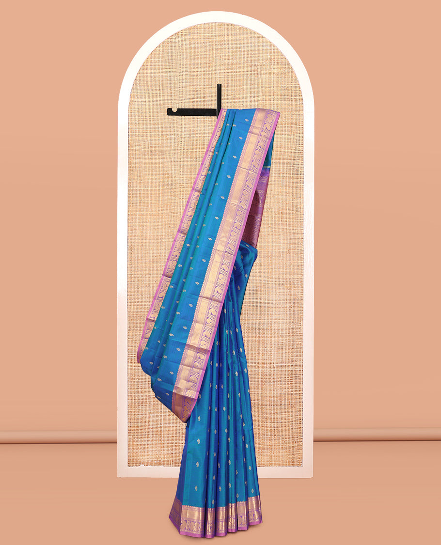 Blue Vasundhara Silk Saree, Woven with Zari Buttas, a Contrast Border of Manga and Mayil Designs, Grand Pallu, and a Contrast Blouse
