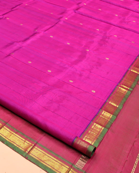 Rani Pink Kanchipuram Silk Saree, Woven with Zari Buttas, Complemented by a Contrast One-Sided Border of Banaras and Jaal Designs, Grand Pallu, and No Blouse
