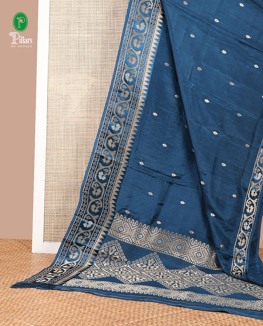 Peacock blue zari butta dola silk saree with patola style design, temple border & rich pallu along with plain blouse