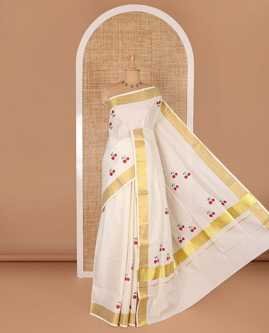 Cream-red vertically striped and cherry fruit motifs printed Kerala cotton saree with zari striped border, printed pallu, and a matching blouse