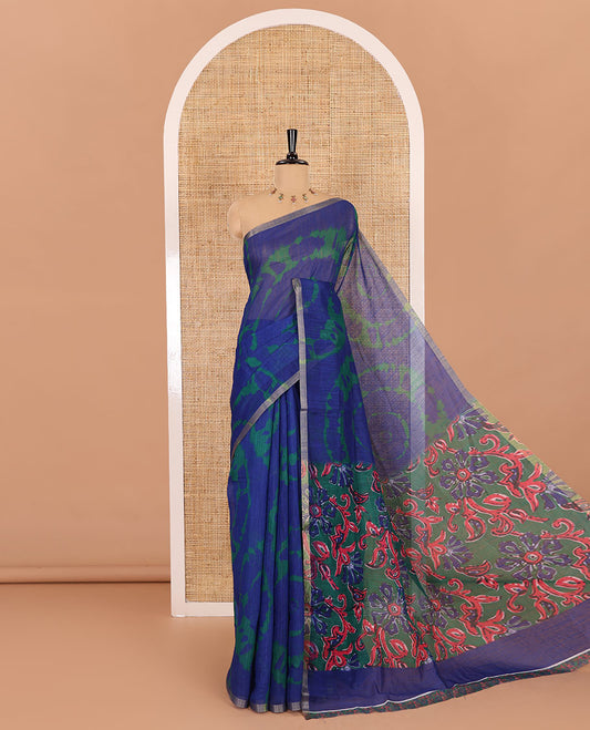 Borderless blue big circle shibori printed linen cotton saree, contrast sanganeri floral block printed pallu, and a contrast printed blouse