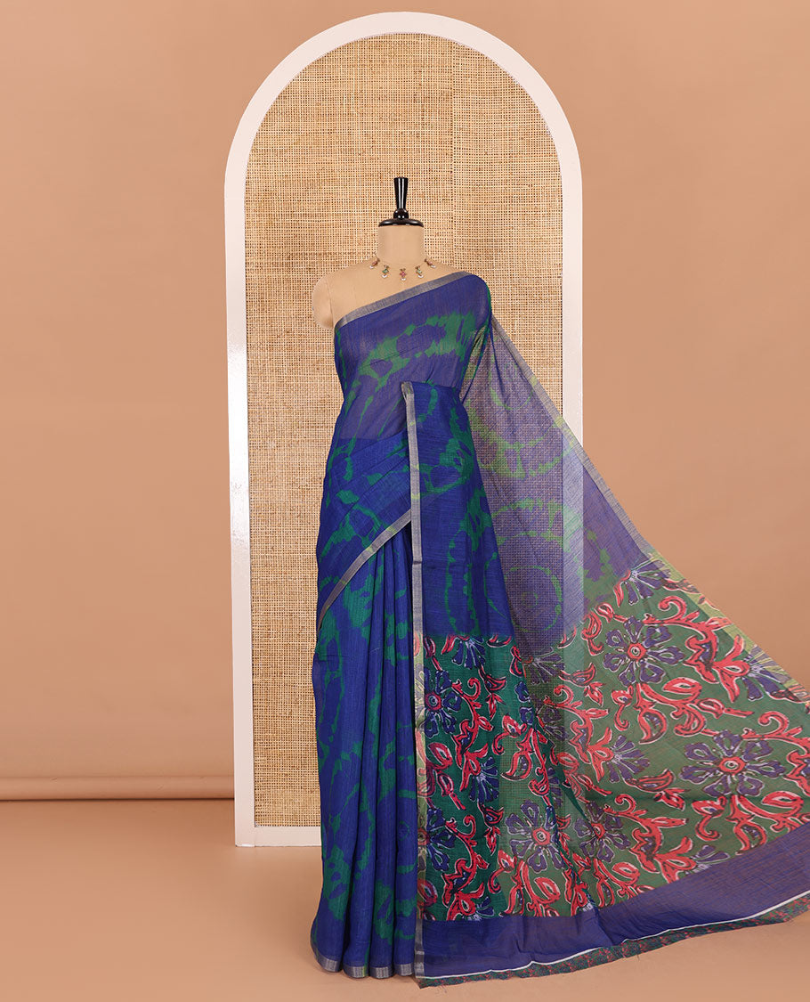 Borderless blue big circle shibori printed linen cotton saree, contrast sanganeri floral block printed pallu, and a contrast printed blouse