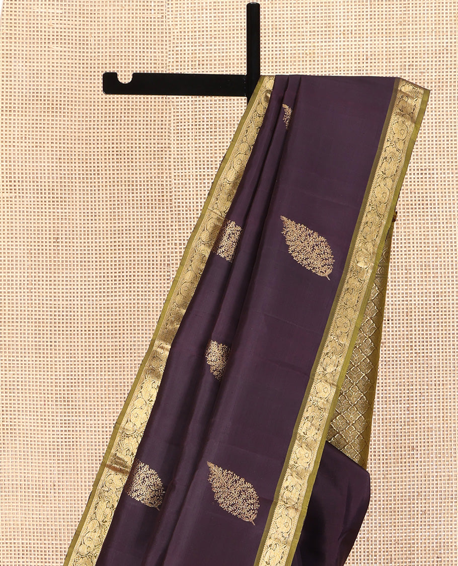 Brown Kanchipuram Silk Saree, Decked Up with Zari Buttas All Over Its Body, Complemented by Contrast Border of Manga and Mayil Designs, Grand Pallu, and Paired with a Contrast Blouse
