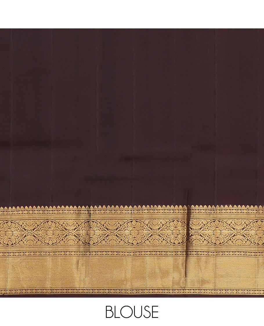 Maroon Vasundhara Silk Saree, Decked Up with Zari Buttas All Over Its Body, Complemented by Contrast Border of Rekku Poun, Muthu, and Floral Designs, Grand Jaal Pallu and Paired with a Contrast Blouse