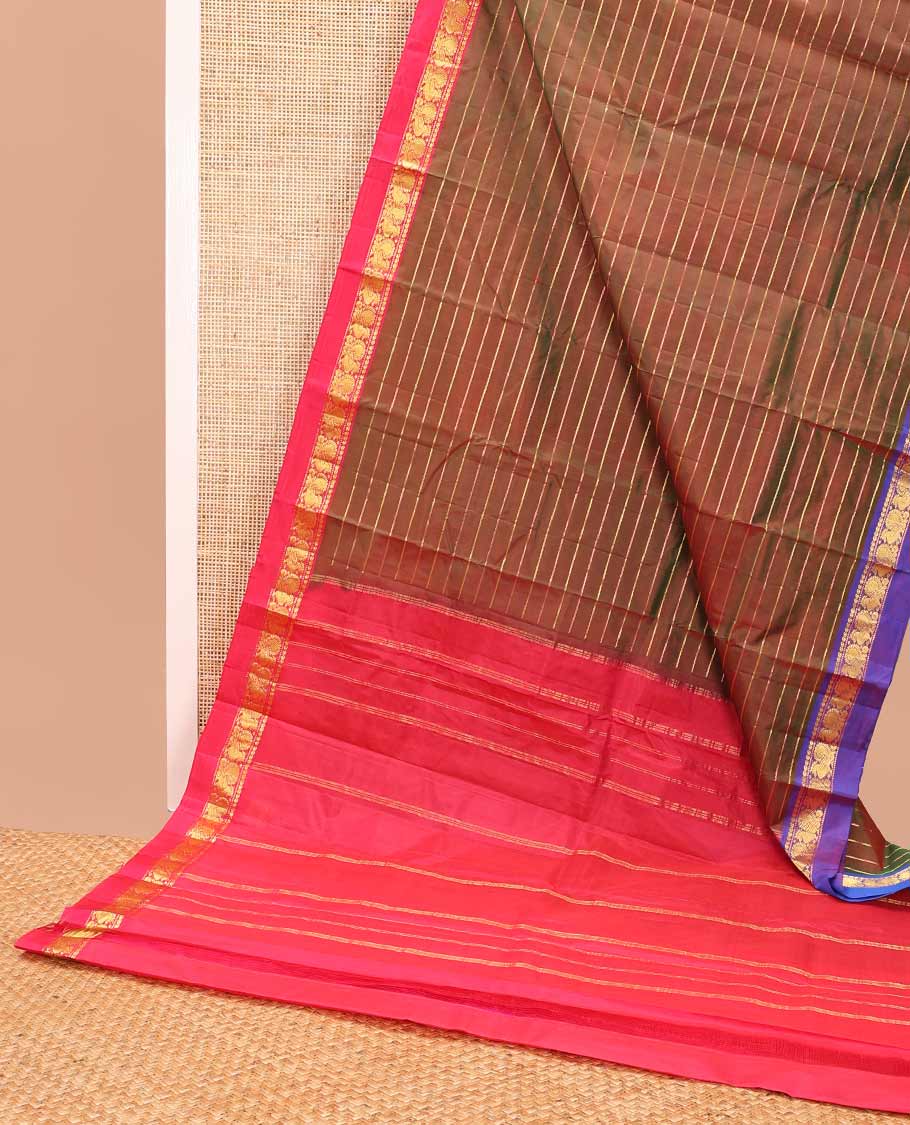 Mustard striped kancheepuram silk saree with contrast ganga jamuna border of thilakam mokku, banaras, paun design & zari design pallu