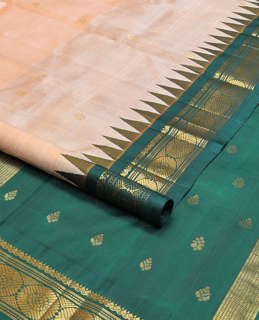 Sandal zari buttas kanchipuram silksaree,contrast one-sided thazampoo rekku border of salngai,muthu,banaras & chakram & zari design pallu