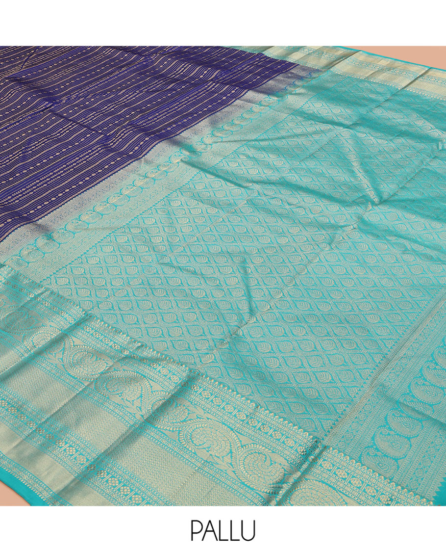 Blue Vasundhara Silk Saree Adorned with Jacquard Design Weave All Over Its Body, Complemented by a Contrast Border of Rekku, Muthu, Laddu Kamalam, Then Kuli Kann, and Dhavana Kodi Designs, Artfully Zari Woven Pallu, and Paired with a Contrast Blouse