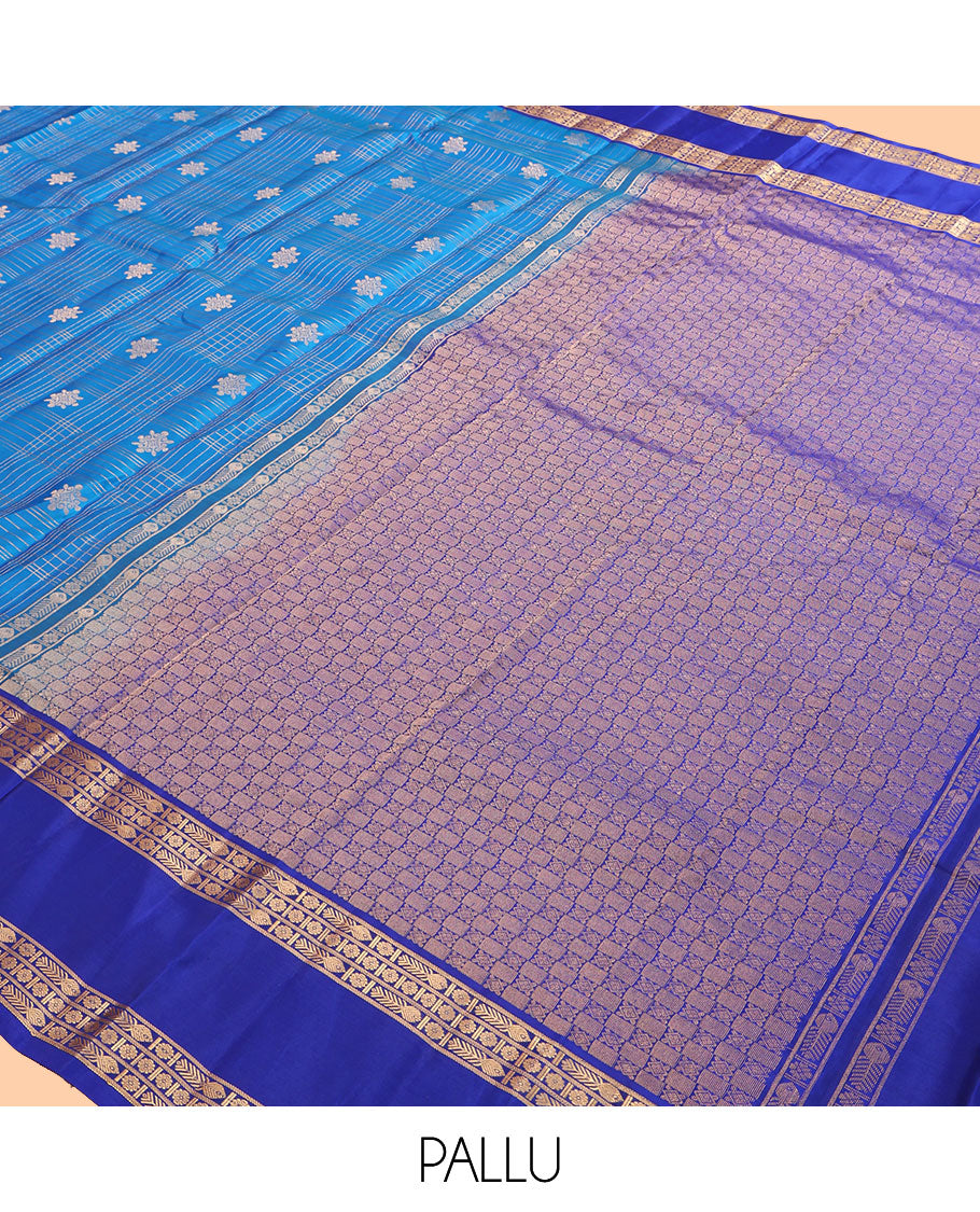 Blue Vasundhara Lite Silk Mix Saree, Gleamed Up with Zari Buttas and Checks, a Contrast Rettai Pettu Border of Meen and Kamalam Designs, Grand Pallu, and a Contrast Blouse