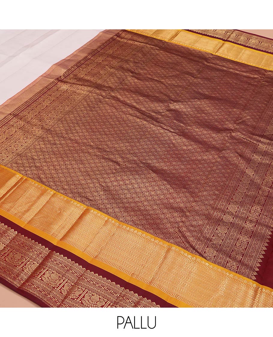 White Plain Vasundhara Silk Saree, Complemented by a Contrast Border of Muthu, Vanki, Rekku, Neli, Greek Key, and Iruthalai Pakshi Designs, Grand Jaal Pallu, and Paired with a Contrast Blouse