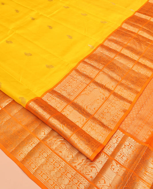 Yellow Vasundhara Silk Saree, Woven with Zari Buttas, Complemented by a Contrast Border of Muthu, Rudraksham, Poun, Mayil, Kuthirai, and Yaali Designs, Grand Pallu, and a Contrast Blouse