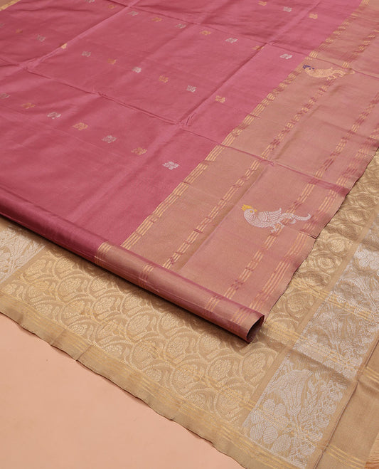 Pink Uppada Silk Saree, Adorned with Zari Buttas on Its Body, Complemented by a Contrast Border of Stripes and Parrot Designs, Pallu of Rose Butta Enclosed Scallop Designs, and Paired with a Contrast Blouse