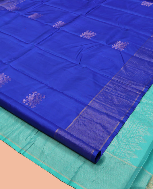 Blue Kanchipuram Silk Saree, Artfully Detailed with Neli Kolam Buttas, Highlighted by Vaira Oosi Striped Border, Contrast Geometric Pallu, and a Contrast Blouse