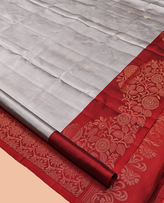 Grey Mayuri Lite Silk Mix Saree, Sparsely Threaded with Buttas, Complemented by Contrast Floral Design Border, Intricate Design Pallu, and Contrast Blouse