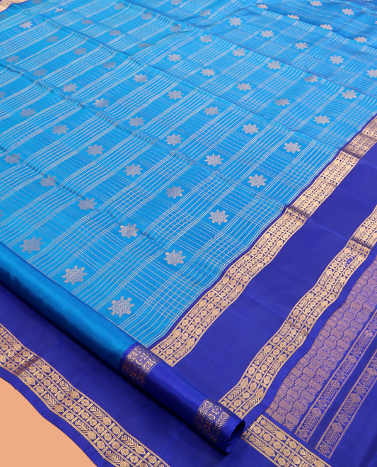 Blue Vasundhara Lite Silk Mix Saree, Gleamed Up with Zari Buttas and Checks, a Contrast Rettai Pettu Border of Meen and Kamalam Designs, Grand Pallu, and a Contrast Blouse