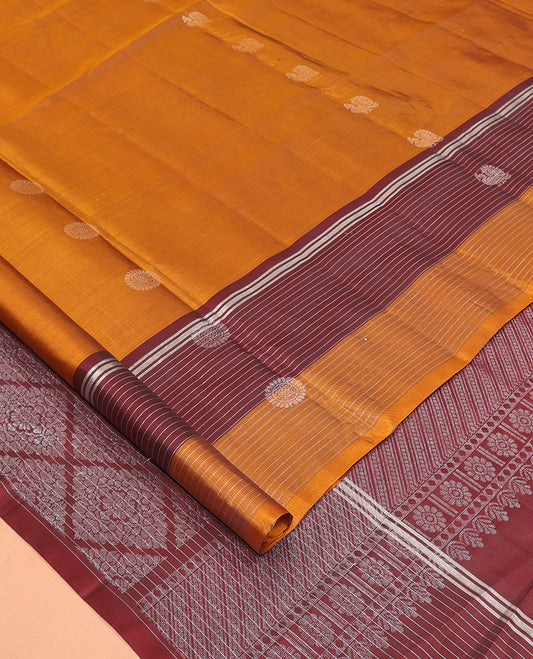 Orange Mayuri Lite Silk Mix Saree, Graced with Mayil and Chakram Zari Buttas, Complemented By Contrast Striped Border of Mayil Design, an Intricate Pallu, and a Contrast Blouse