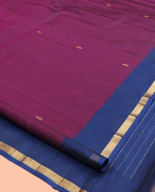 Wine Kanchipuram Silk Saree, Elevated with Zari Buttas, Complemented by a Contrast Zari Border, Pallu of Zari Design, and a Contrast Blouse