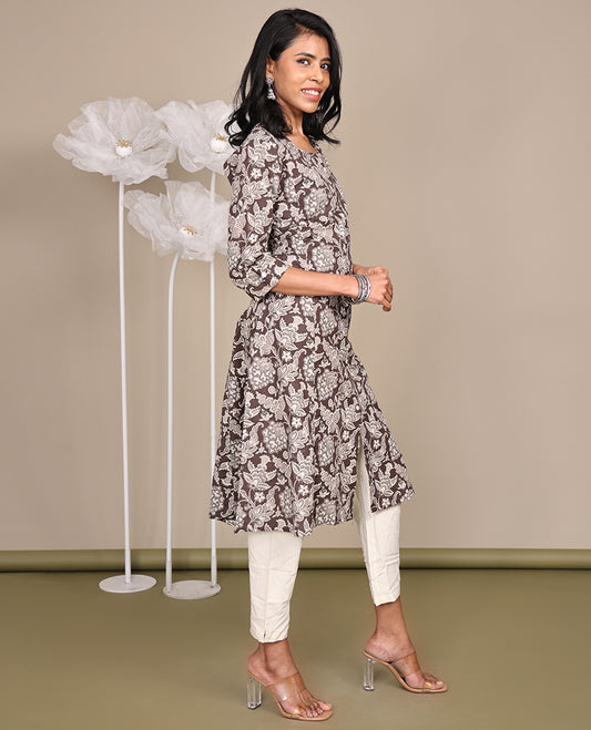 Brown Floral Printed Below-Knee-Length Cotton Kurti, Adorned with Round Neckline, 3/4 Sleeves, and A-Line Length