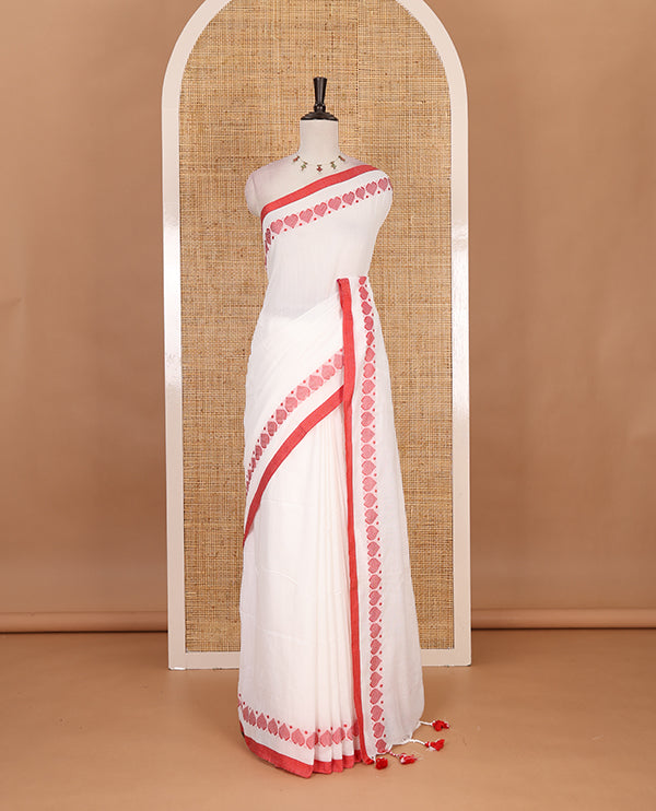 White plain khadi cotton saree with contrast border and plain pallu with tussels