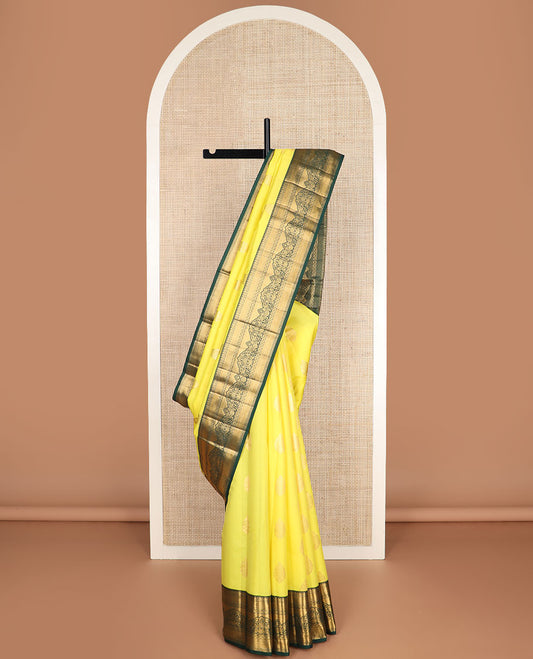 Yellow zari buttas vasundhara silkmix saree, contrast intricate pallu & border of thilakam,rudraksham,diamond & floral design