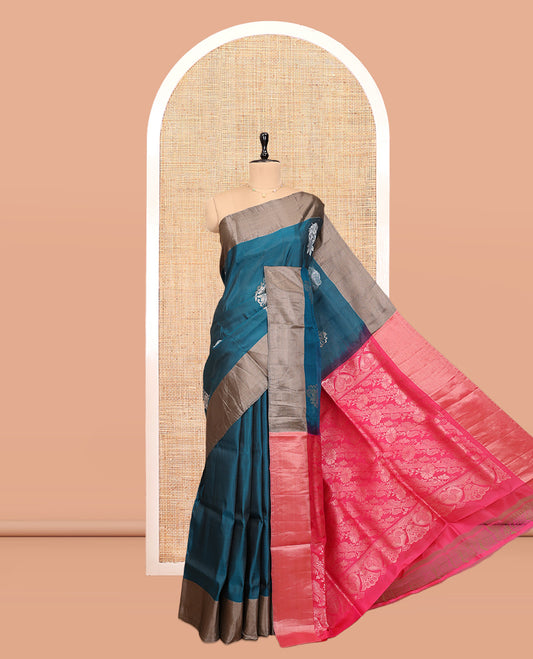 Peacock Blue Uppada Saree, Ornamented with Floral Buttas, a Bavanji Border, Contrast Intricate Pallu, and a Contrast Blouse
