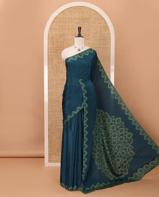 Ramar blue plain design turkey crepe saree, triangle motif printed border, leaf-like shape printed pallu & printed blouse
