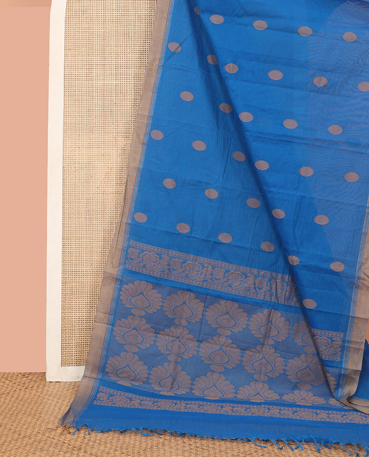 Blue Kanchi Cotton Saree, Elevated with Polka Dot Buttas All Over Its Body, Complemented by a Contrast Border, Pallu Features Floral Designs, and Paired with a Matching Blouse