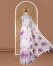 White big flower printed with Chikankari-style thread floral embroidered linen cotton saree, zari bavanji border, and blouse of print and embroidery work