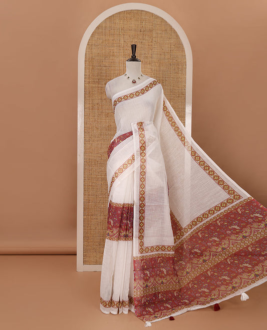 White half-plain & half-printed linen cotton saree, maroon-color diamond-patterned border, kalamkari-style flora-fauna printed pallu & diamond jaal printed blouse