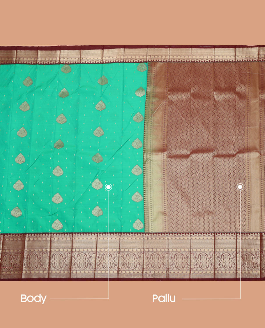 Green Budget Silk Saree, Accentuated with Zari Buttas on Its Body, Complemented by a Contrast Traditional Zari Design-Woven Border, Geometric Patterned Pallu, and Paired with a Contrast Blouse