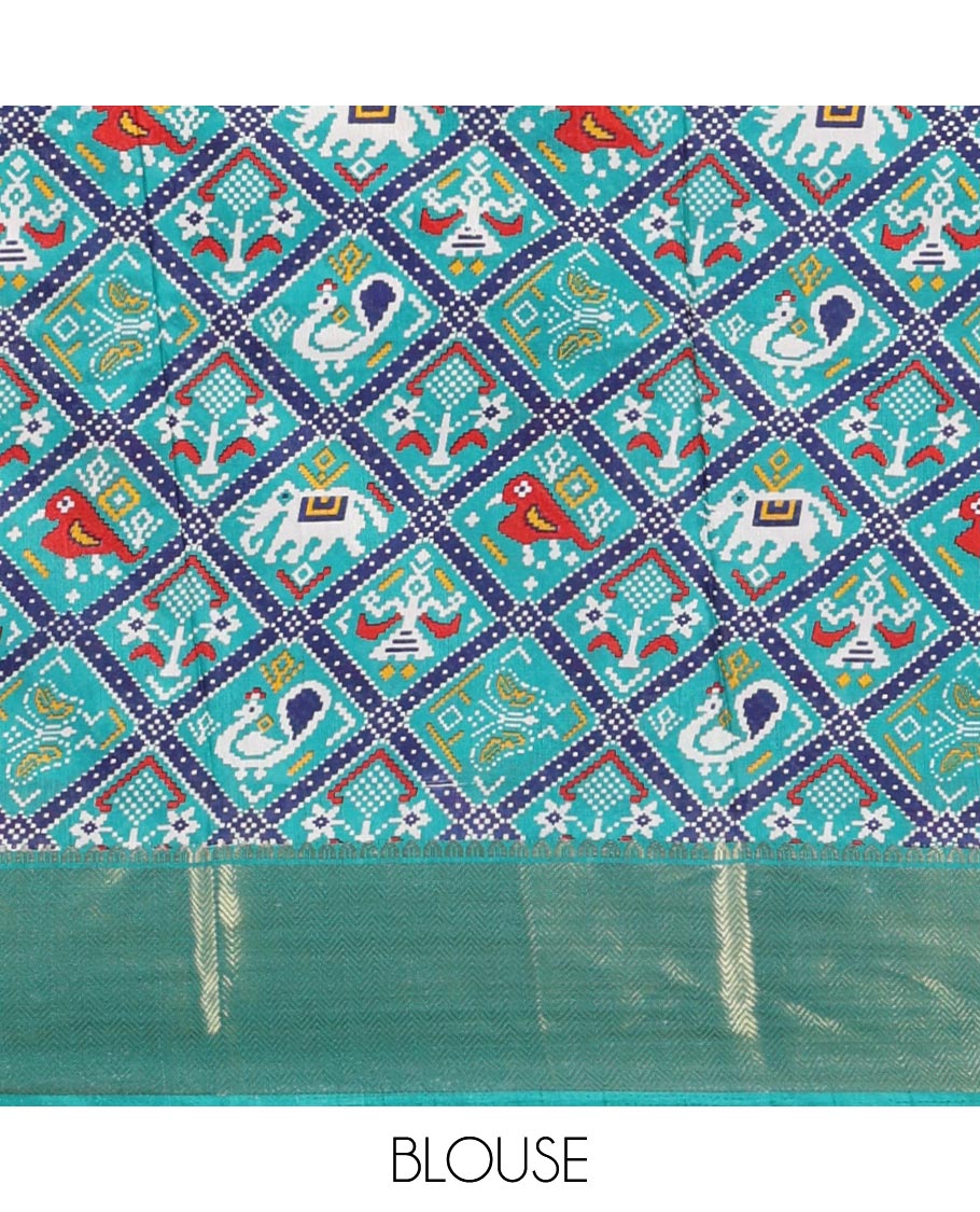 Navy blue plain dola-tussar saree, contrast temple zari border, patola animal motifs enclosed jaal printed pallu & patola printed blouse