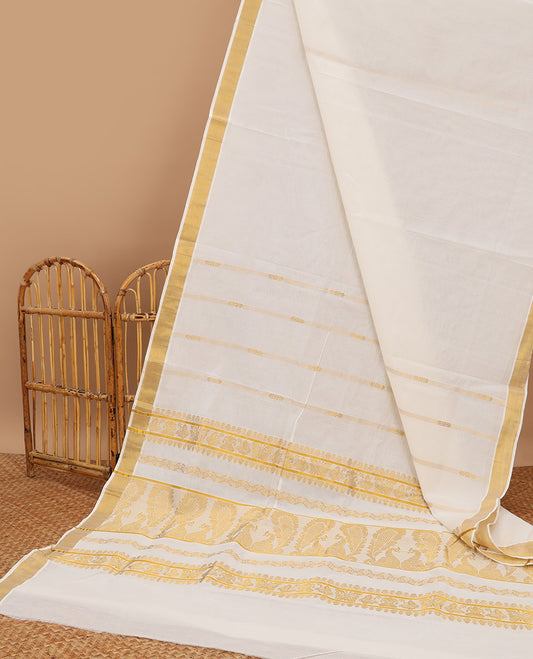 Cream kerala saree with zari designs, plain border & pallu of intricate zari designs