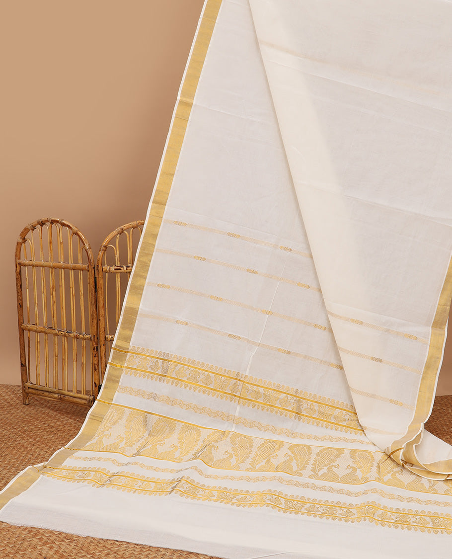 Cream kerala saree with zari designs, plain border & pallu of intricate zari designs