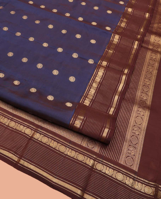 Blue Vasundhara Lite Silk Mix Saree, Embellished with Zari Buttas All Over Its Body, Complemented by Contrast Varisai Pettu Border of Rekku, Muthu, Annam Chakram, and Kathir Designs, Grand Pallu of Jaal Design, and Paired with a Contrast Blouse