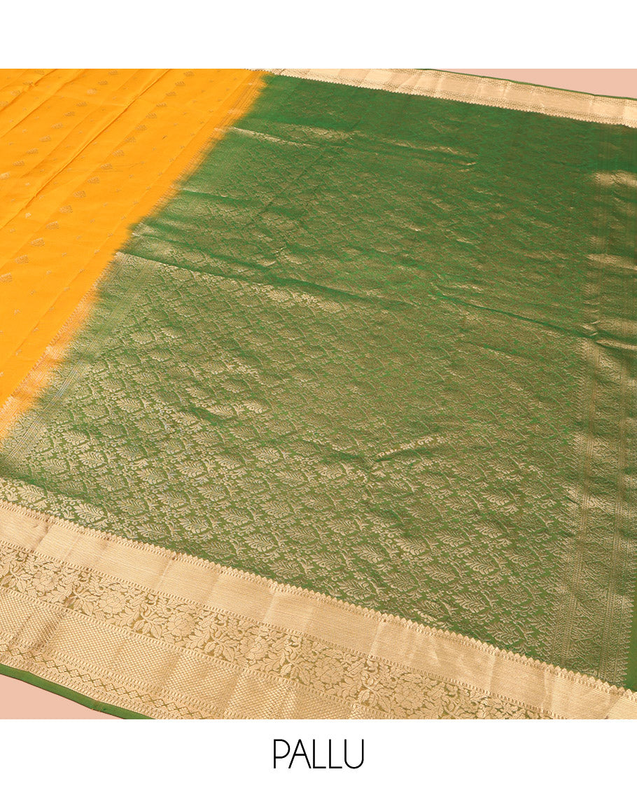 Yellow Vasundhara Lite Silk Mix Saree, Subtly Sparkled with Zari Buttas, Complemented by a Contrast Border of Thilakam Mokku, Muthu, Kodi Visiry, Diamond, and Kuyil Kann Designs, Beautifully Bedecked Pallu, and Paired with a Contrast Blouse
