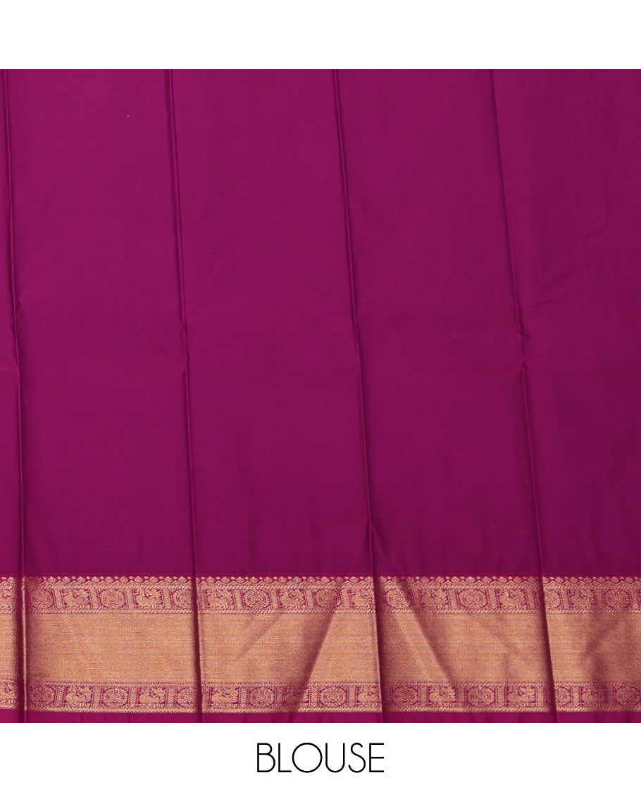 Navy Blue Budget Silk Saree, Decked Up with Zari Buttas All Over Its Body, Complemented by a Contrast Traditional Zari Peacock-Chakram Border, Grand Jaal Pallu, and Paired with a Contrast Blouse