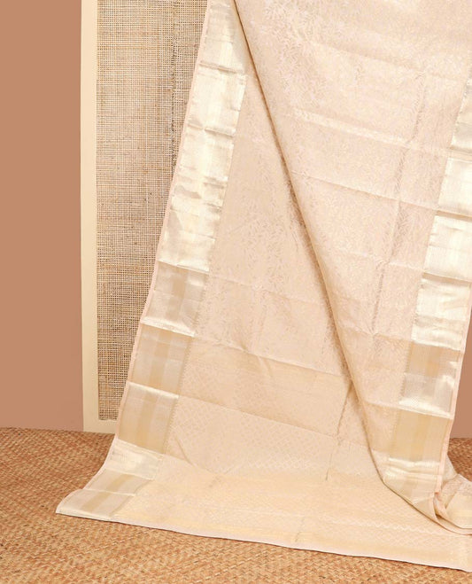 Cream floral vine design kancheepuram silk saree with self border of banaras, checked design border & floral design pallu