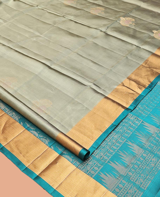 Green Mayuri Lite Silk Mix Saree, Subtly Sparkled with Zari Buttas on Its Body, Complemented by a Contrast Bavanji Border, a Contrast Pallu of Intricate Designs, and Paired with a Contrast Blouse