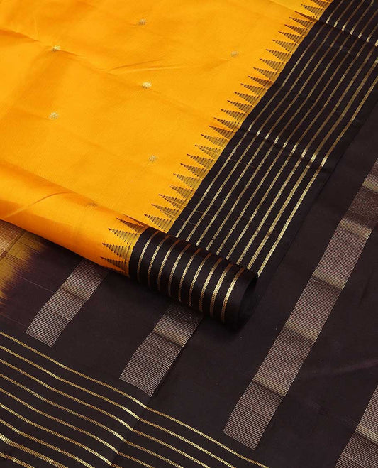 Yellow buttas silk saree with contrast border of rekku, banaras design & striped pallu