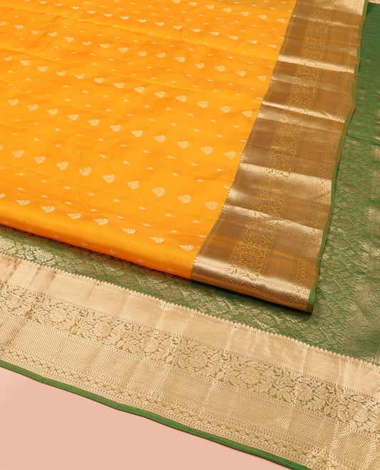 Yellow Vasundhara Lite Silk Mix Saree, Subtly Sparkled with Zari Buttas, Complemented by a Contrast Border of Thilakam Mokku, Muthu, Kodi Visiry, Diamond, and Kuyil Kann Designs, Beautifully Bedecked Pallu, and Paired with a Contrast Blouse