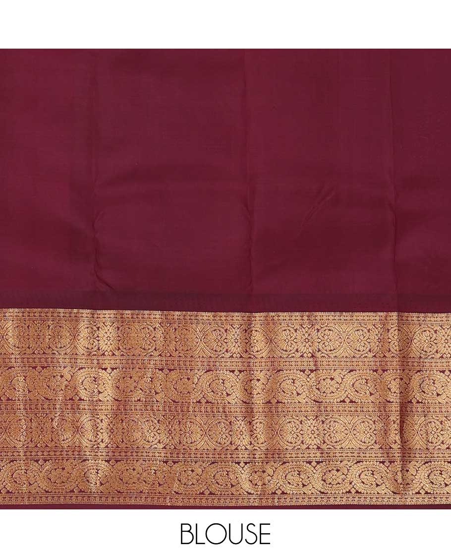 Sandal zari buttas silk saree, contrast border of ara bogudi, jadai nagam, and dhavana kodi, and spade motifs steeped pallu
