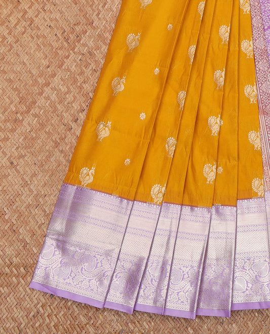 Yellow Budget Silk Saree, Beautified with Floral and Peacock Buttas All Over Its Body, Complemented by a Contrast Traditional Zari Design Woven Border, Majestically Detailed Pallu, and Paired with a Contrast Blouse