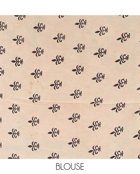 Green floral-peacock machine printed kalamkari cotton saree, contrast lotus printed border, and pallu of floral-peacock print