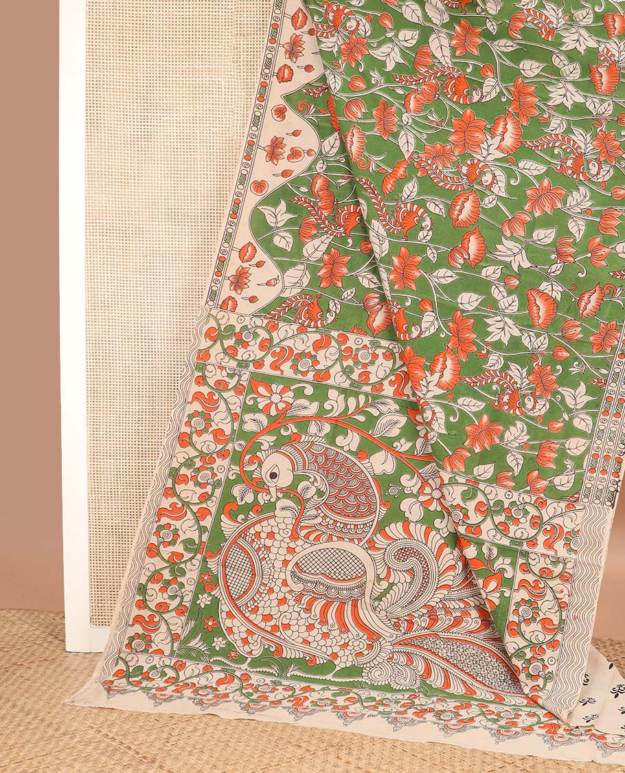 Green floral-peacock machine printed kalamkari cotton saree, contrast lotus printed border, and pallu of floral-peacock print